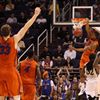 Bradley Beal of the Florida Gators dunks the ball as Erik Murphy celebrates while taking on the Marquette Golden Eagles during the 2012 NCAA Men\