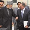 U.S. Secretary of Defense Leon Panetta talks with Afghanistan President Hamid Karzai during a visit to the Presidential Pallace on March 15 in Kabul, Afghanistan. Panetta visited with troops and met with President Hamid Karzai and other Afghan officials during his two-day visit to the country. Afghan President Hamid Karzai reportedly wants Afghan forces to take over a year earlier in 2013 and wants U.S. troops to pull out of villages after a U.S. soldier allegedly killed 16 Afghan civilians.